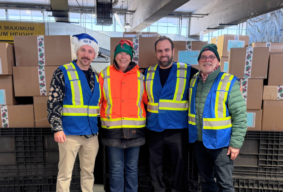 GLS Employees in front of boxes
