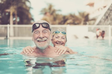 Happy older couple in swimming pool